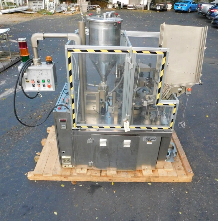 Used COMADIS METAL TUBE FILLER C 100 S Tube Fillers New Jersey US | Champion Trading Corporation #423608
