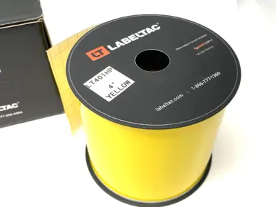 USED LABELTAC PRO MODEL HIGH PERF. VINYL LABEL, YELLOW, 4" OPEN, SOME USED