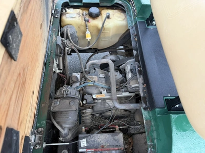 (1) 2015 E-Z-Go golf cart with a Kawasaki gas engine, includes canopy, ball cover, club cover, fold-...