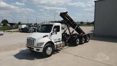 New | in-Stock 2027 PETERBILT 548 Rolloff Trucks Texas US | Roll Off Truck World #1492013