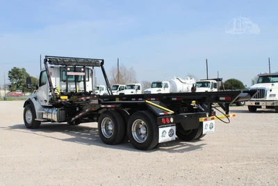 New | in-Stock 2027 PETERBILT 548 Rolloff Trucks Texas US | Roll Off Truck World #1492015