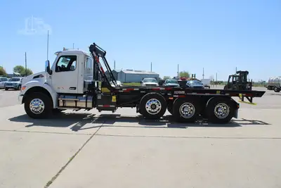 New | in-Stock 2027 PETERBILT 548 Rolloff Trucks Texas US | Roll Off Truck World #1492012