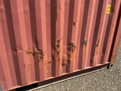 20’ Shipping / Storage Container 8’ wide x 8’ 6” tall, swing doors on one end, wood deck, rings for ...