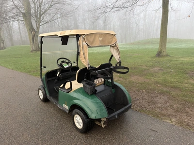 (1) 2015 E-Z-Go golf cart with a Kawasaki gas engine, includes canopy, ball cover, club cover, fold-...