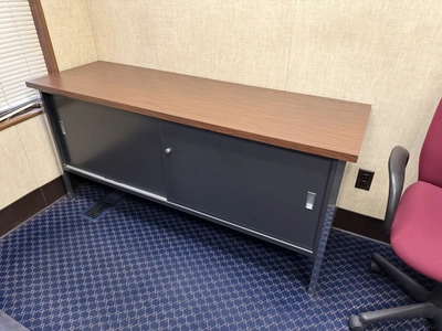 Contents of office furniture, includes (1) steel frame, wood desk, 76" x 38", (2) rolling office cha...