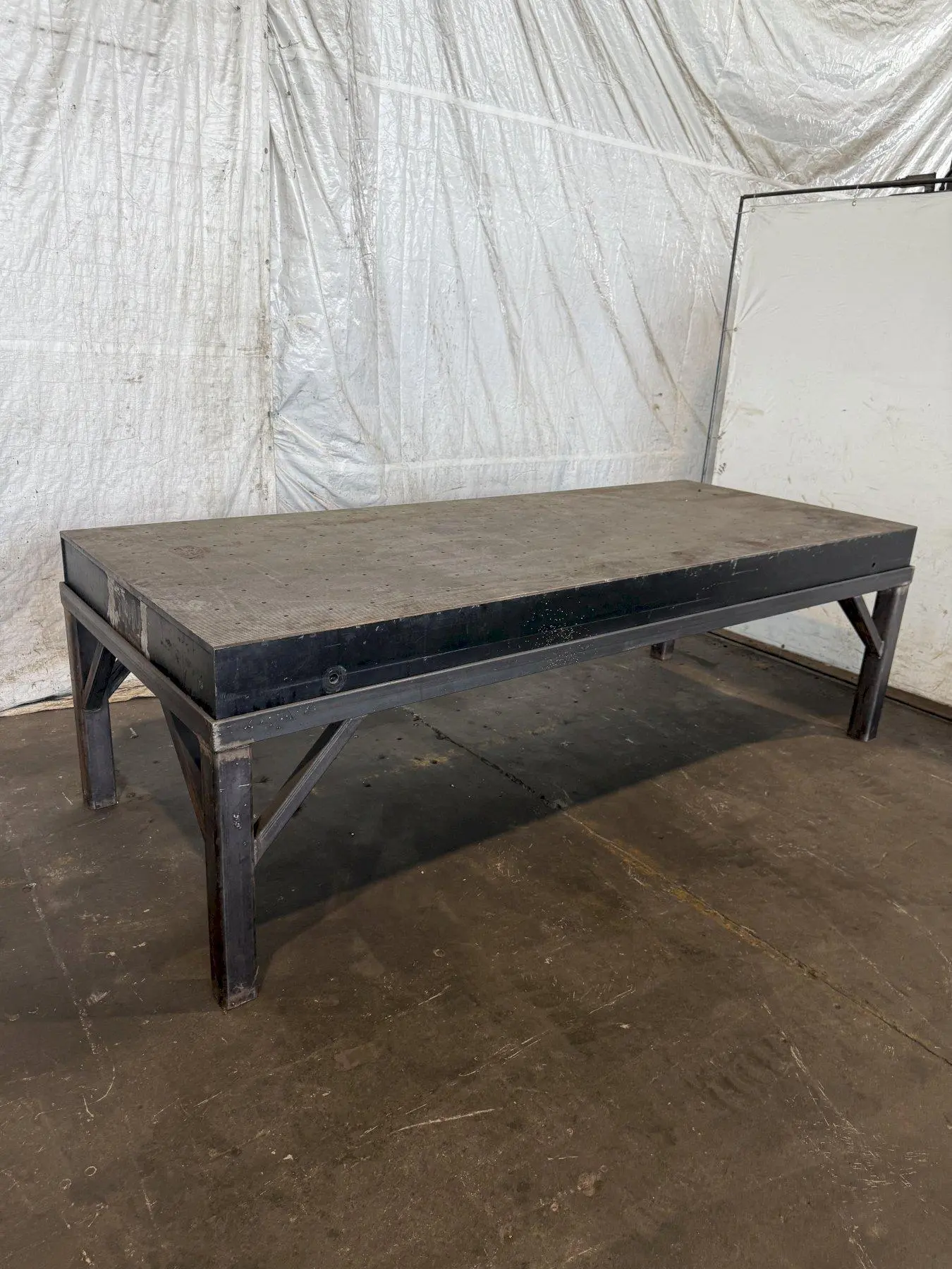 50" X 124" DRILLED & TAPPED STEEL LAYOUT TABLE W/ STAND. STOCK # 0667025.