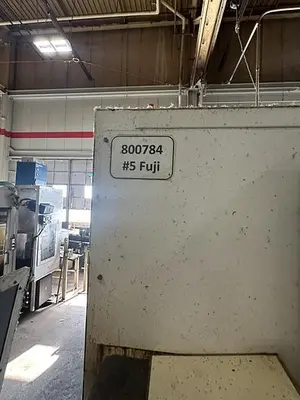 Used 2013 FUJI ANW 35 TWIN TURRET CNC LATHE, TAIL STOCK WITH ROBOT LOAD/UNLOAD AND STOCKER TABLES CNC Lathes | Harbor Machinery Inc. #1283394