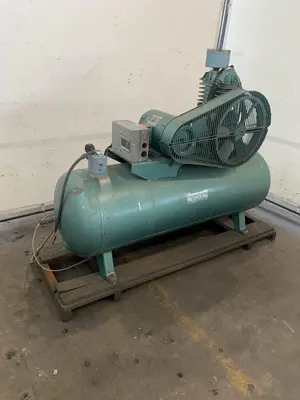 5 HP ROL-AIR HORZONTAL AIR COMPRESSOR. STOCK # 0469124.