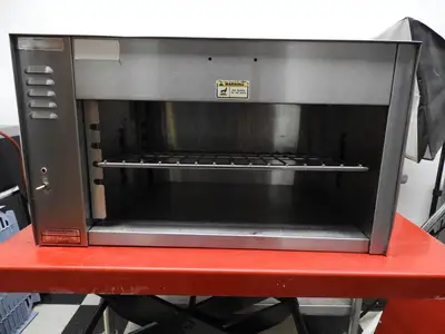 Used APW Wyott Used APW Wyott CMC-24 Countertop Electric Cheese Melter Toaster 208V Salamanders & Cheese Melters Illinois US | Falcon Restaurant Supply #1376457
