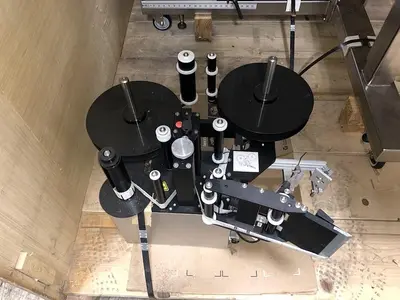 USED SOUTHERN CALIFORNIA PACKAGING CO. ST 1100 TUBE LABELER