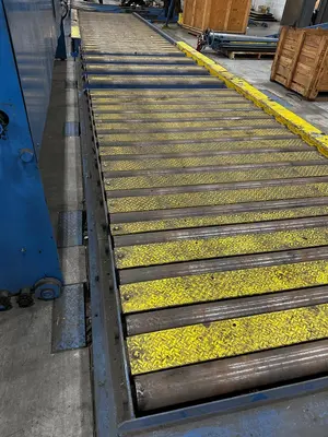 51' Powered Floor Mounted Exit Conveyor