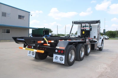 New | in-Stock 2027 PETERBILT 548 Rolloff Trucks Texas US | Roll Off Truck World #1492013