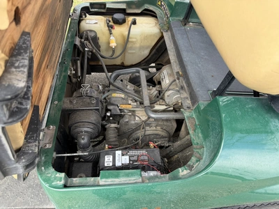 (1) 2015 E-Z-Go golf cart with a Kawasaki gas engine, includes Club canopy and ball washer, fold-dow...
