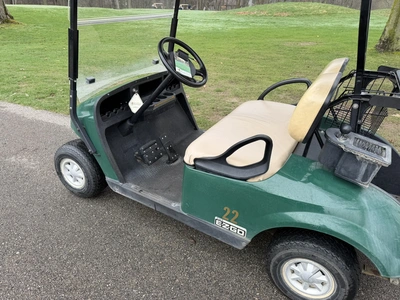 (1) 2015 E-Z-Go golf cart with a Kawasaki gas engine, does not include Club canopy, includes ball wa...