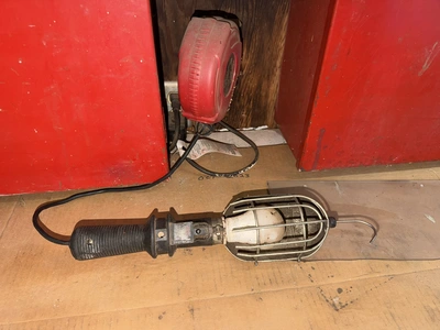 (2) Auto Call single door storage cabinets filled with assorted electrical items, including Push Mat...