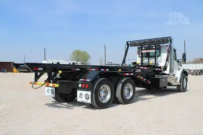 New | in-Stock 2027 PETERBILT 548 Rolloff Trucks Texas US | Roll Off Truck World #1492019