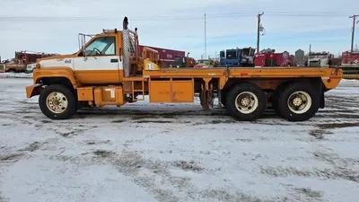 USED 2000 GMC C8500 TANDEM AXLE BED TRUCK