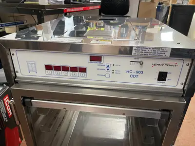 Used Henny Penny Used Henny Penny HC-903 CDT Heated Holding Pass Thru Cabinet with Flip Doors and Timers 120V Hot Food Warming, Holding, & Transport Cabinets Illinois US | Falcon Restaurant Supply #1375758