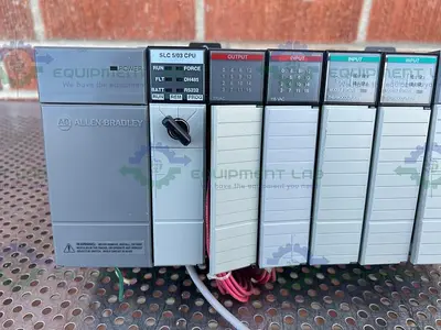 USED ALLEN BRADLEY SLC 500 1746-P1 PROCESSOR UNIT W/ 1747-L532, 1746-NT4 MODULES