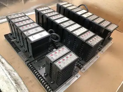 Texas Instruments 6MT 32-bit PLC I/O Logic Interfaces w/ 3 Chassis / 28 Modules