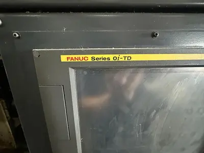 Used FUJI ANW 35 TWIN TURRET CNC LATHE, TAIL STOCK WITH ROBOT LOAD/UNLOAD AND STOCKER TABLES CNC Lathes | Harbor Machinery Inc. #1283396