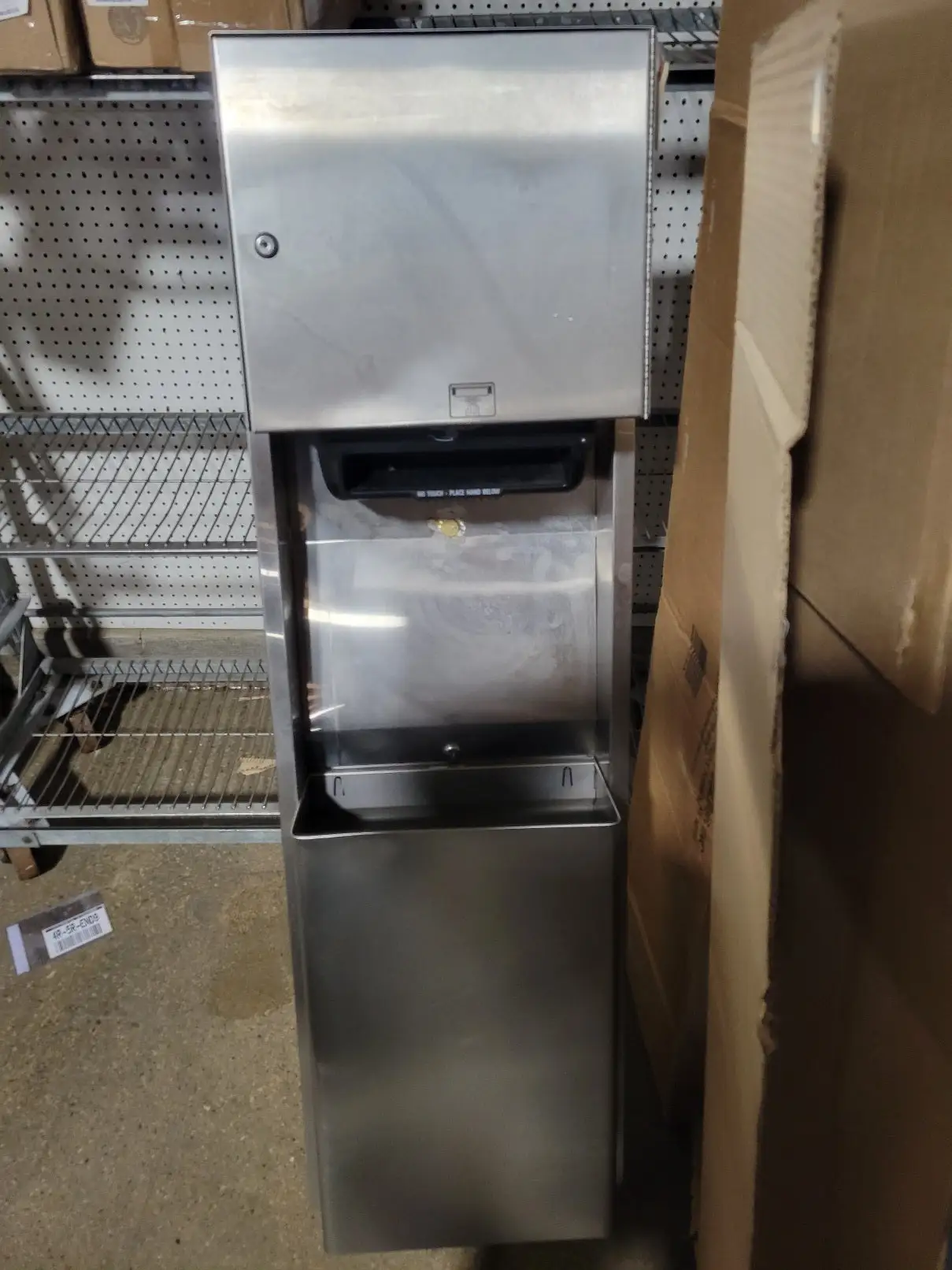 Hands Free Towel Disp W/Can S/S Wall mount unit.