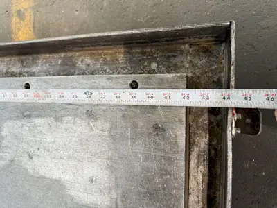 42" WIDE X 72" LONG X 6" THICK T-SLOTTED BOLSTER PLATE. STOCK # 1006324