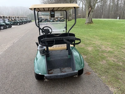 (1) 2015 E-Z-Go golf cart with a Kawasaki gas engine, does not include Club canopy, includes ball wa...