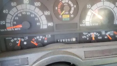 USED 2000 GMC C8500 TANDEM AXLE BED TRUCK