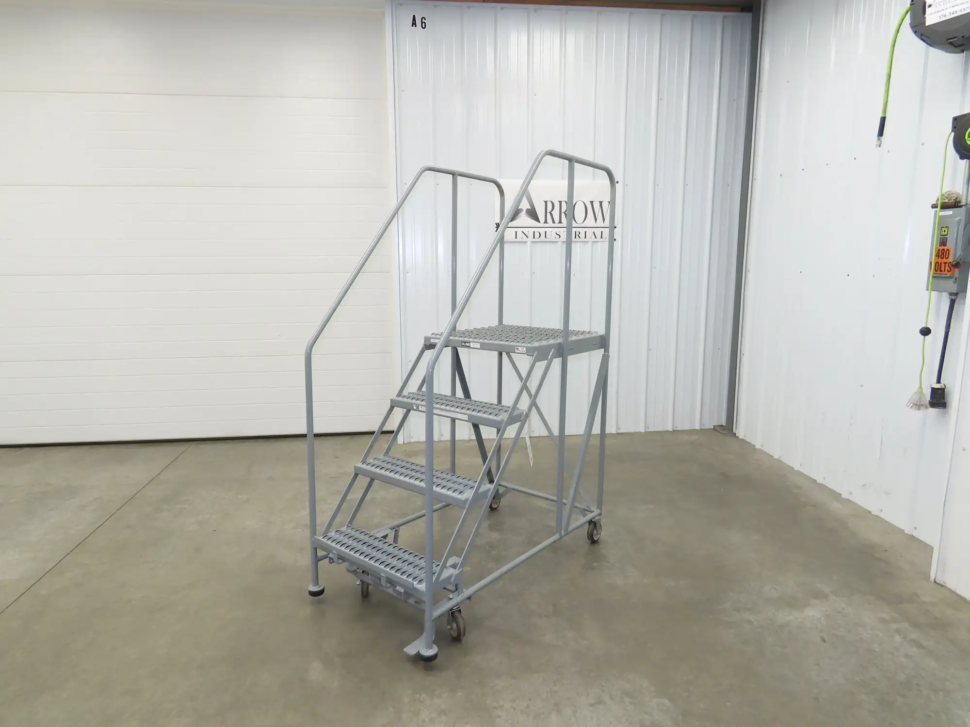 Uline H-7919 Rolling Ladder 4 Step 36" Work Platform 40" Top Step 800lbs Cap