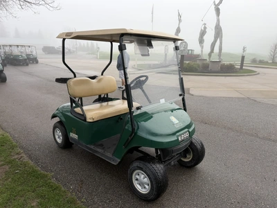 (1) 2017 E-Z-Go golf cart with a Kawasaki gas engine, model 625111G01, includes canopy, ball cover, ...