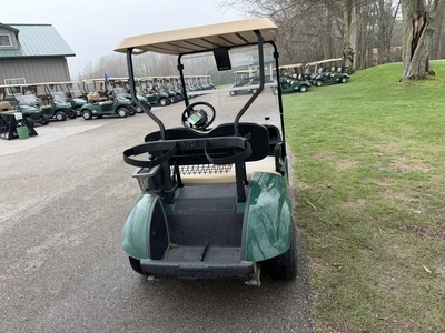 (1) 2015 E-Z-Go golf cart with a Kawasaki gas engine, does not include Club canopy, includes ball wa...