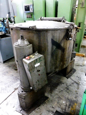 Tolhurst 40" Center-Slung chip wringer.