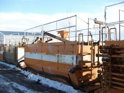 USED 20 M3 (120 BBL) SKID MOUNTED 2 COMPARTMENT MUD TANK