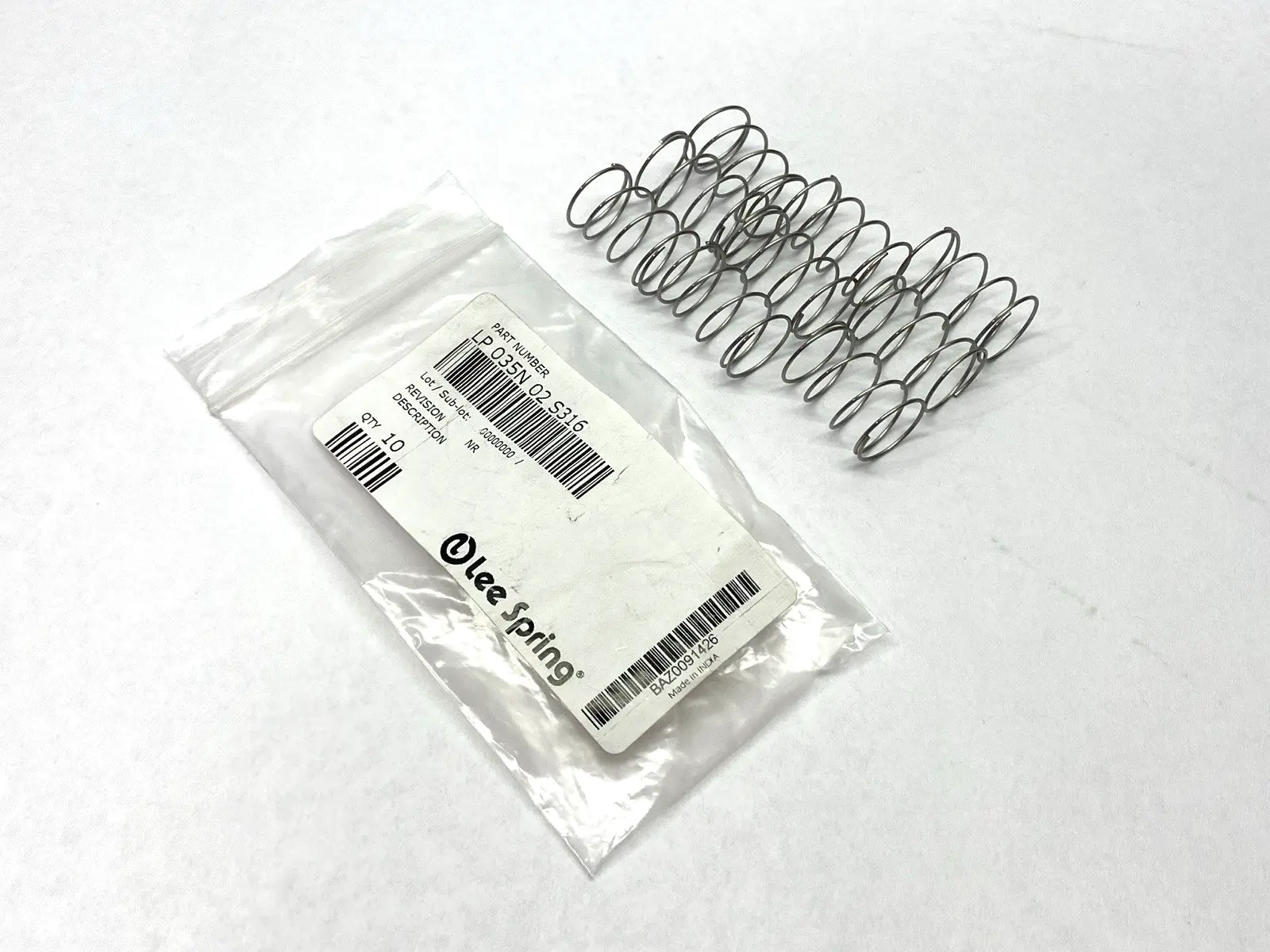 USED LEE SPRING COMPRESSION SPRING 1" X .72" OD X .203" H LOT OF 9