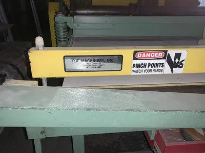 USED RJE SHEAR-SLITTER BOX MAKING MACHINE