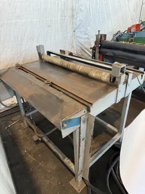 48” X 4" ARBOR STRILICH SLITTING LINE WITH FAMCO CUT OFF SHEAR & AMS CONTROLS. STOCK # 0664425