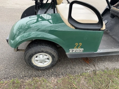 (1) 2015 E-Z-Go golf cart with a Kawasaki gas engine, does not include Club canopy, includes ball wa...