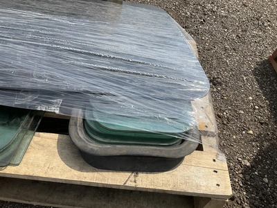 Lot of window glass for semi truck doors and sleeper cabs, used