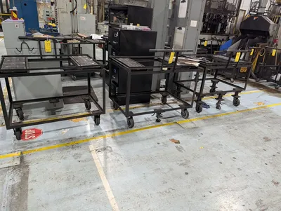 (7) Rolling Roller Conveyor Carts (Contents Excluded)
