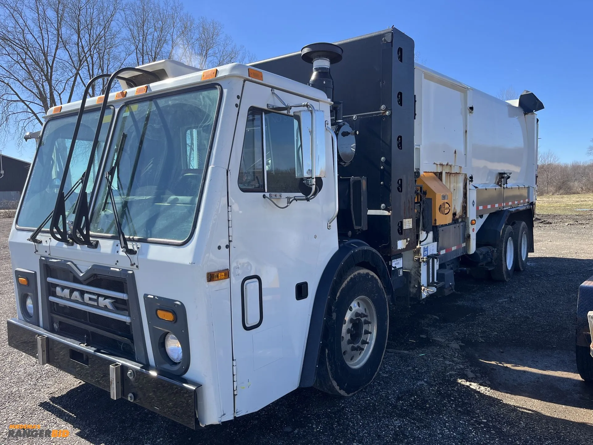 USED 2013 MACK LEU633 REFUSE PACKER BODY WITH AUTO ARM.