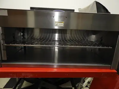 New | in-Stock APW Wyott Used APW Wyott CMC-36 36 1/2" Countertop Cheese Melter New Elements - 208V Salamanders & Cheese Melters Illinois US | Falcon Restaurant Supply #1376472