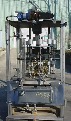 USED 12 HEAD ROTARY VACUUM FILLER 12 HEAD