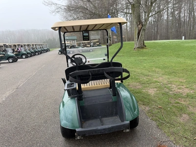 (1) 2015 E-Z-Go golf cart with a Kawasaki gas engine, does not include Club canopy, includes ball wa...