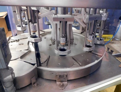 USED JG VACUUM FILLER 12 STATION