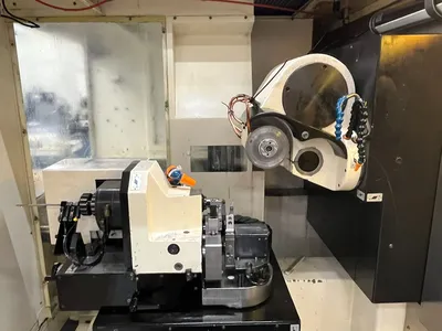 USED 1999 ROLLOMATIC CNC600X