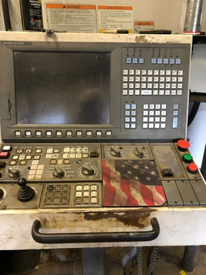 USED OKUMA MILLAC 1052V