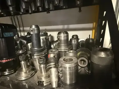 150PC CNC TOOLING LOT: CAT40/50, BT40/50, HSK63, COLLET, END MILL, SHRINK-FIT, BORING HEADS