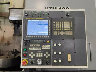 USED 2011 OKUMA VTM-100