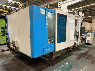 2010 KRAUSS MAFFEI KM650-300-400CKZ 2-COLOR Injection Molding Horizontal/Vertical | Machinery Network (1)